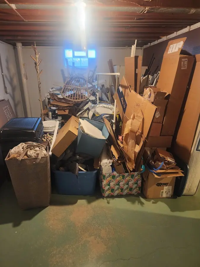 Roll-off dumpster container at job site for 2 Yard Dumpster Rental in Geneva